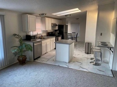 PRIME LOT ON THE CREEK!!! NEWLY REMODELED IN 2022! This 3 - photo 1