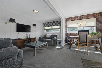 A charming expanded 3-bedroom, 2.5-bath split-level home located - photo 14