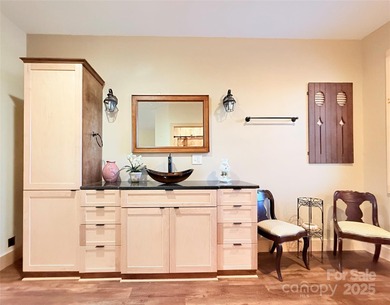 HANDICAP-accessible, ONE-story living on 4.4+/- rare, LEVEL