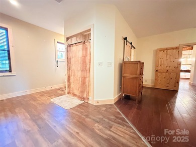 HANDICAP-accessible, ONE-story living on 4.4+/- rare, LEVEL