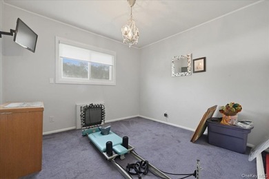 A charming expanded 3-bedroom, 2.5-bath split-level home located - photo 23