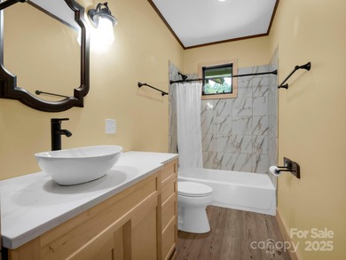 HANDICAP-accessible, ONE-story living on 4.4+/- rare, LEVEL