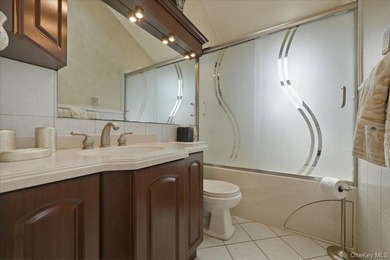A charming expanded 3-bedroom, 2.5-bath split-level home located - photo 24