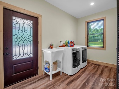 HANDICAP-accessible, ONE-story living on 4.4+/- rare, LEVEL