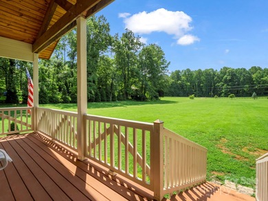 HANDICAP-accessible, ONE-story living on 4.4+/- rare, LEVEL