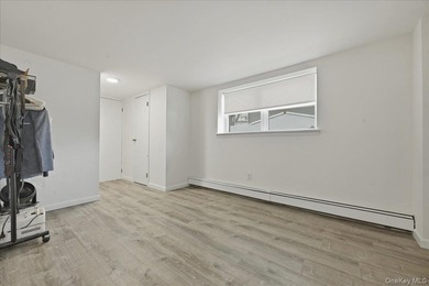 A charming expanded 3-bedroom, 2.5-bath split-level home located - photo 29