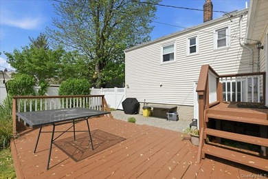 A charming expanded 3-bedroom, 2.5-bath split-level home located - photo 35