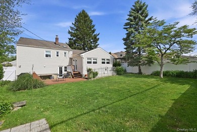 A charming expanded 3-bedroom, 2.5-bath split-level home located - photo 37