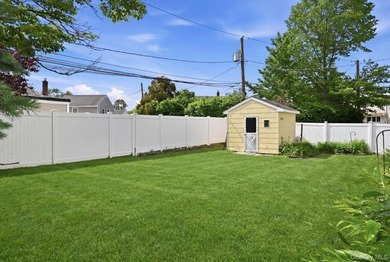 A charming expanded 3-bedroom, 2.5-bath split-level home located - photo 39