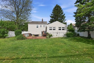 A charming expanded 3-bedroom, 2.5-bath split-level home located - photo 41