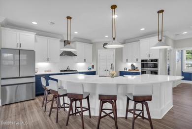 Coastal luxury meets low-maintenance living in this beautifully