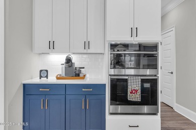 Coastal luxury meets low-maintenance living in this beautifully