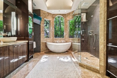 Nestled on an expansive lot in the prestigious guard-gated - photo 10