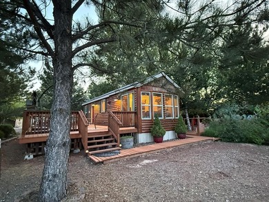 (private lake, pond, creek) Home Sale Pending in Cascade Idaho