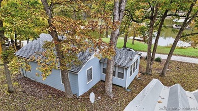 Tucked away in a quiet lakeside subdivision, this charming - photo 11