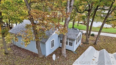 Tucked away in a quiet lakeside subdivision, this charming - photo 12
