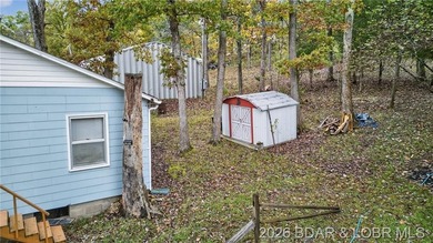 Tucked away in a quiet lakeside subdivision, this charming - photo 14