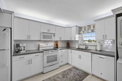 Experience exceptional waterfront living in this beautifully - photo 15