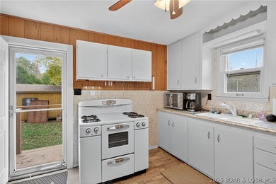 Tucked away in a quiet lakeside subdivision, this charming - photo 16