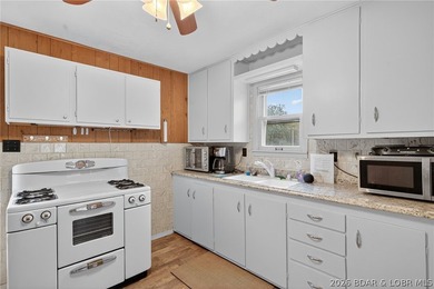 Tucked away in a quiet lakeside subdivision, this charming - photo 18