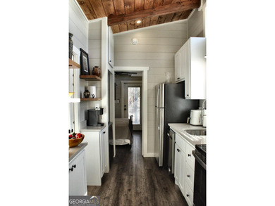 Experience the charm of tiny living in this light and airy 2024 - photo 18