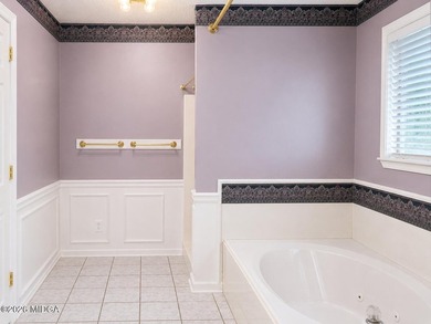 Located in the gated lake community of Lake Wildwood, this - photo 18