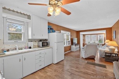 Tucked away in a quiet lakeside subdivision, this charming - photo 19