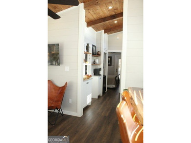 Experience the charm of tiny living in this light and airy 2024 - photo 21