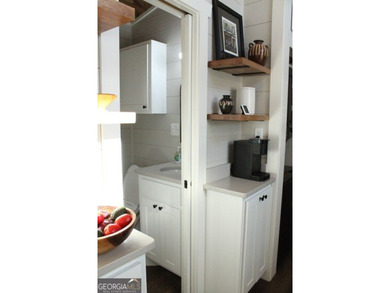 Experience the charm of tiny living in this light and airy 2024 - photo 25