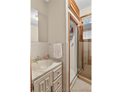Tucked away in a quiet lakeside subdivision, this charming - photo 37