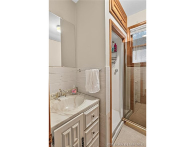 Tucked away in a quiet lakeside subdivision, this charming - photo 37