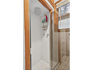 Tucked away in a quiet lakeside subdivision, this charming - photo 38