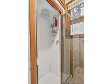 Tucked away in a quiet lakeside subdivision, this charming - photo 38