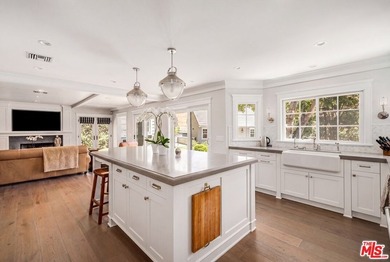 Nestled on a sprawling, park-like acre within the prestigious - photo 11
