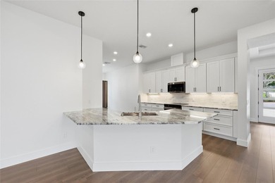 Welcome to this stunning BRAND-NEW CUSTOM-BUILT home in the - photo 11