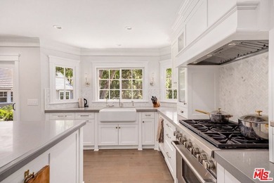 Nestled on a sprawling, park-like acre within the prestigious - photo 14