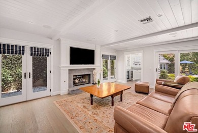 Nestled on a sprawling, park-like acre within the prestigious - photo 15