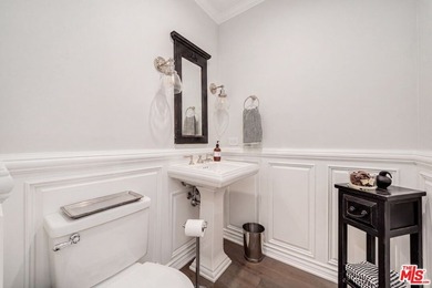 Nestled on a sprawling, park-like acre within the prestigious - photo 19