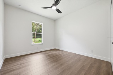 Welcome to this stunning BRAND-NEW CUSTOM-BUILT home in the - photo 22