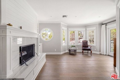 Nestled on a sprawling, park-like acre within the prestigious - photo 23