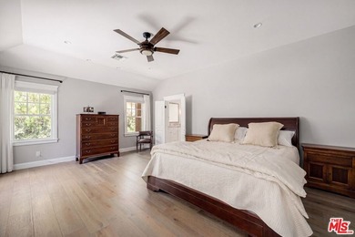 Nestled on a sprawling, park-like acre within the prestigious - photo 25