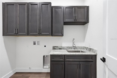 Welcome to this stunning BRAND-NEW CUSTOM-BUILT home in the - photo 26