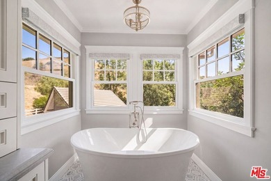 Nestled on a sprawling, park-like acre within the prestigious - photo 27