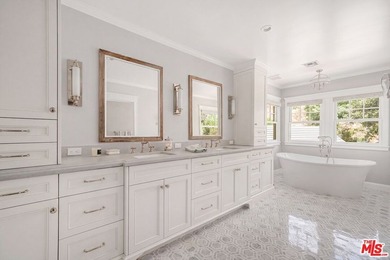 Nestled on a sprawling, park-like acre within the prestigious - photo 28