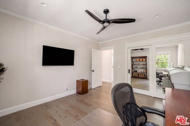 Nestled on a sprawling, park-like acre within the prestigious - photo 32