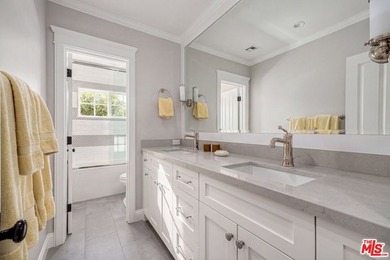 Nestled on a sprawling, park-like acre within the prestigious - photo 34