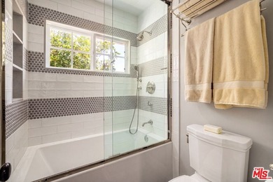 Nestled on a sprawling, park-like acre within the prestigious - photo 35
