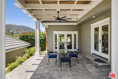 Nestled on a sprawling, park-like acre within the prestigious - photo 38