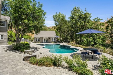 Nestled on a sprawling, park-like acre within the prestigious - photo 39