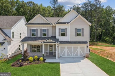 Lake Home For Sale in Flowery Branch, Georgia